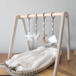 Skinnie wooden baby gym | Solid wood play arch with natural hangers - natural